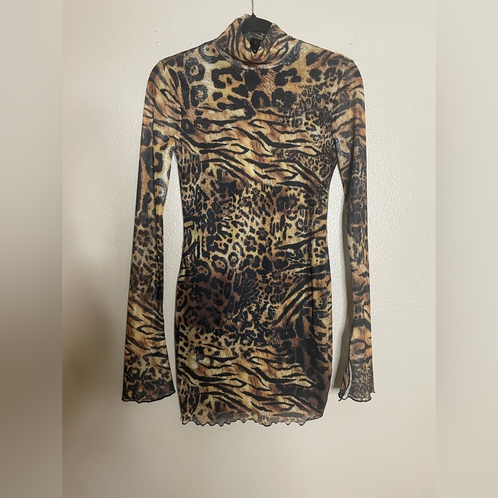 Animal Print Mesh Knitted
All Over Print Stand Collar long bell sleeves Sz Sm - Picture 5 of 14